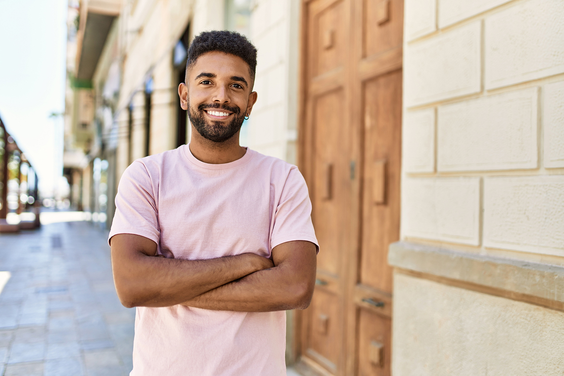 A dentist gently examines a patient's mouth during a dental emergency in a modern dental clinic.